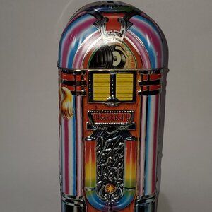 JUKEBOX COIN BANK MADE IN ENGLAND, METAL WARE, EMBOSSED ARTWORK ALL SIDES!